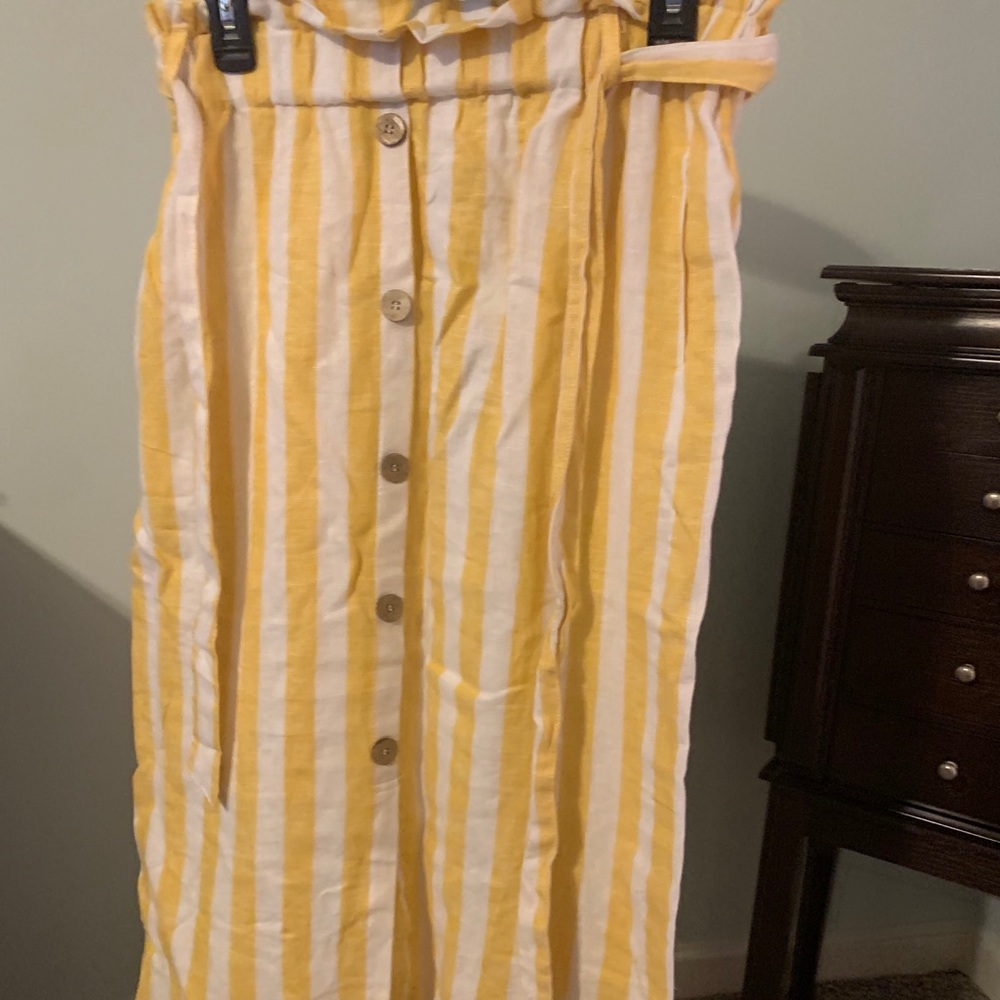 Mid length yellow and white striped skirt